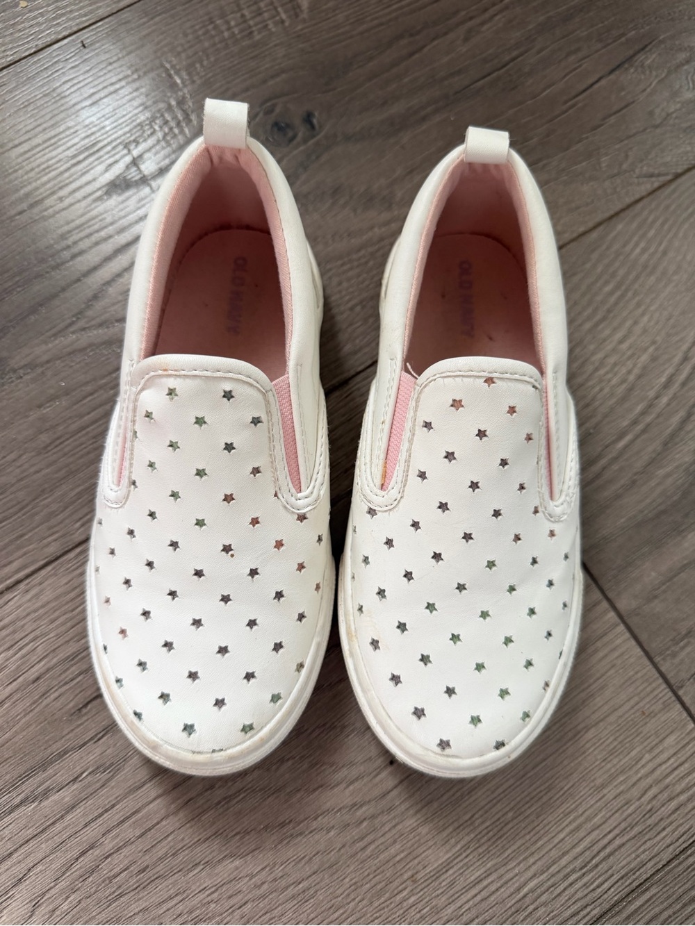 Girls White Slip-On Sneakers with Pink Trim and Star Cutouts